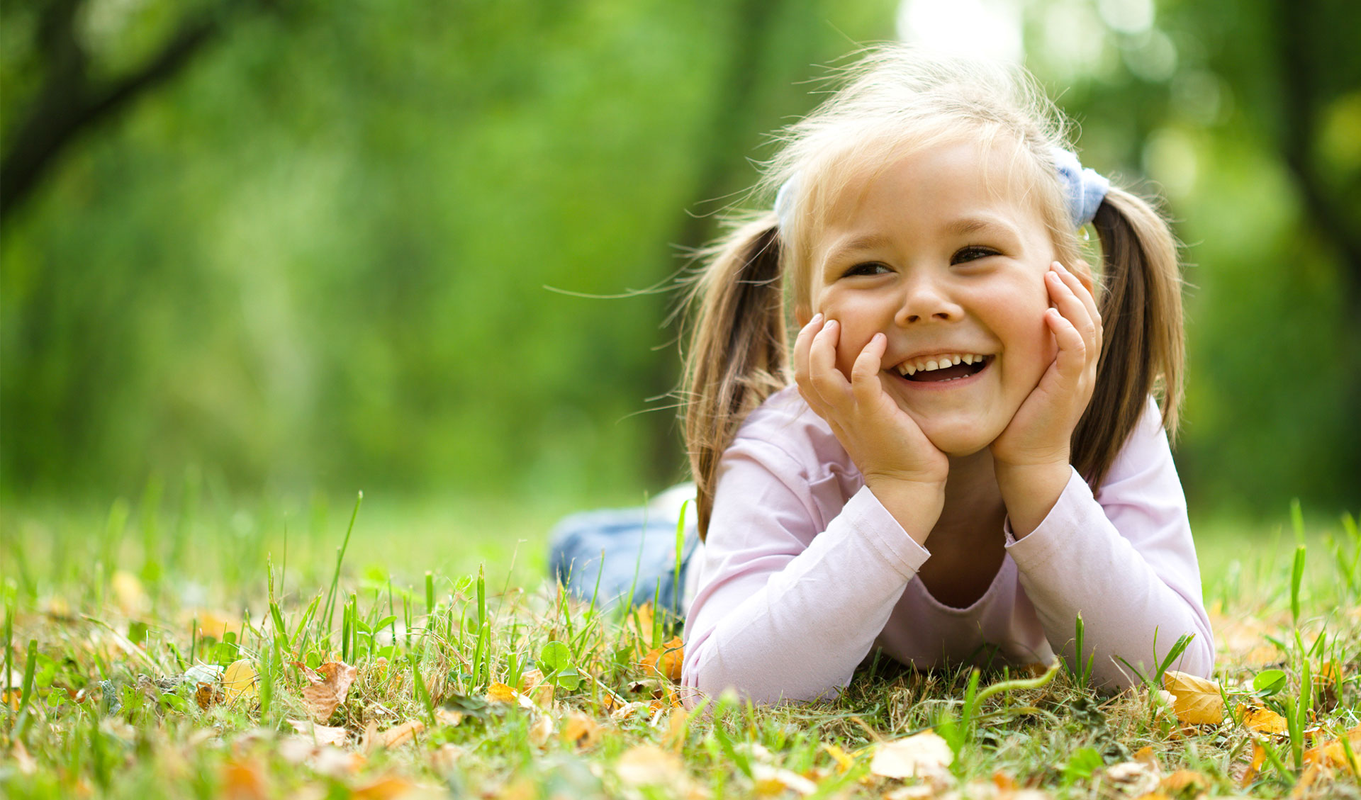 Girl laying in grass